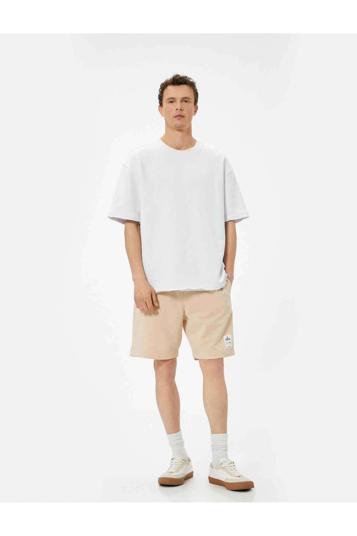 شلوارک برمودا با جیب چاپ شده با برچسب توری کمری