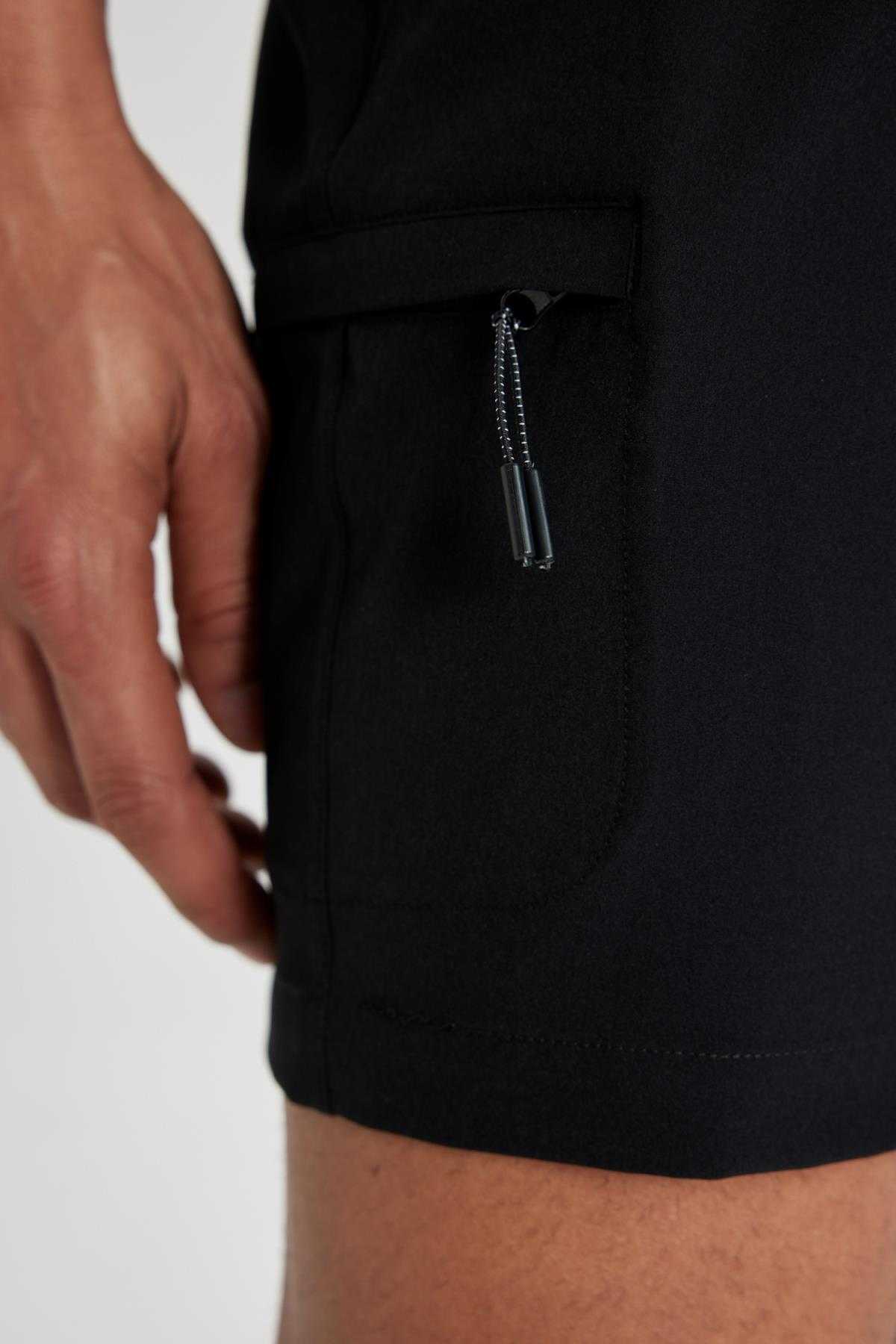 شورت شنای کوتاه بافت انعطاف پذیر چاپ شده DeFactoFit