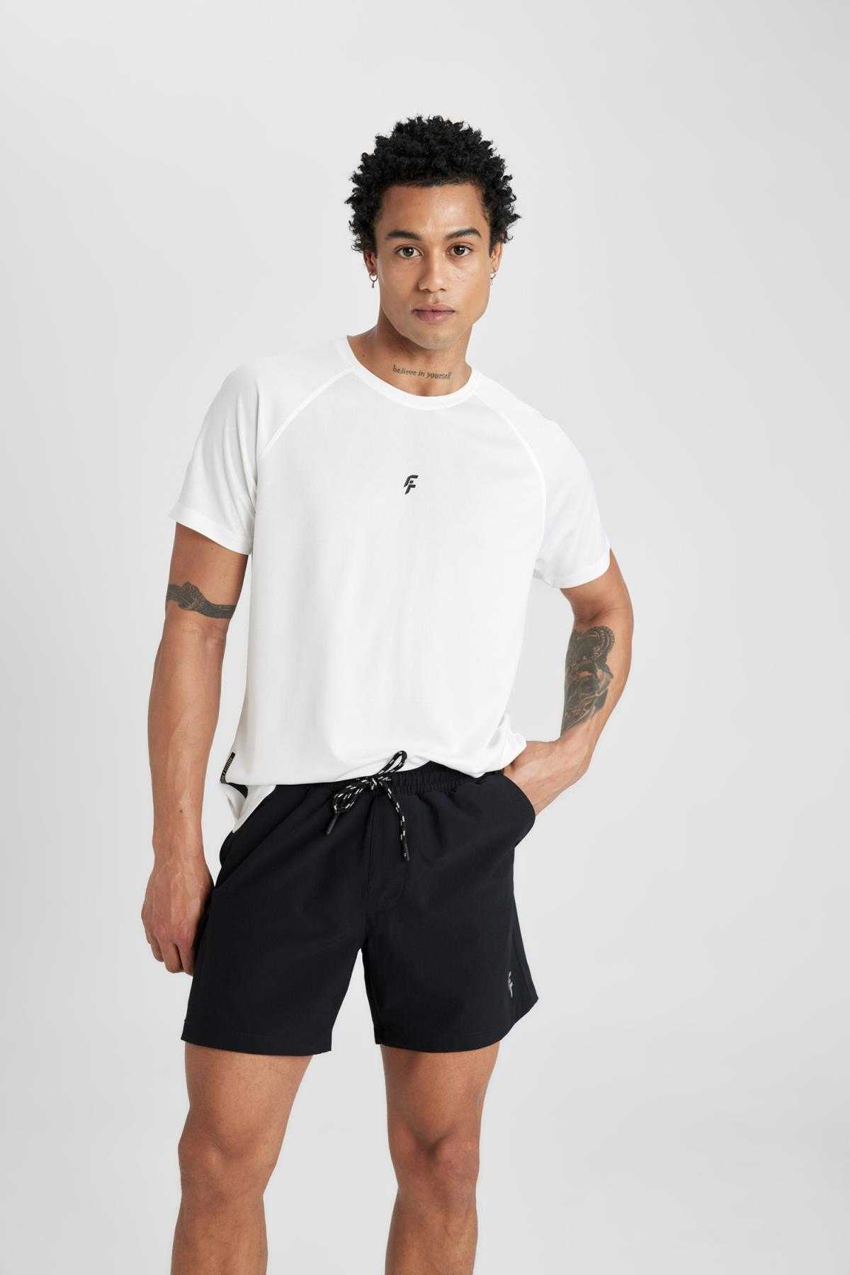 شورت شنای کوتاه بافت انعطاف پذیر چاپ شده DeFactoFit