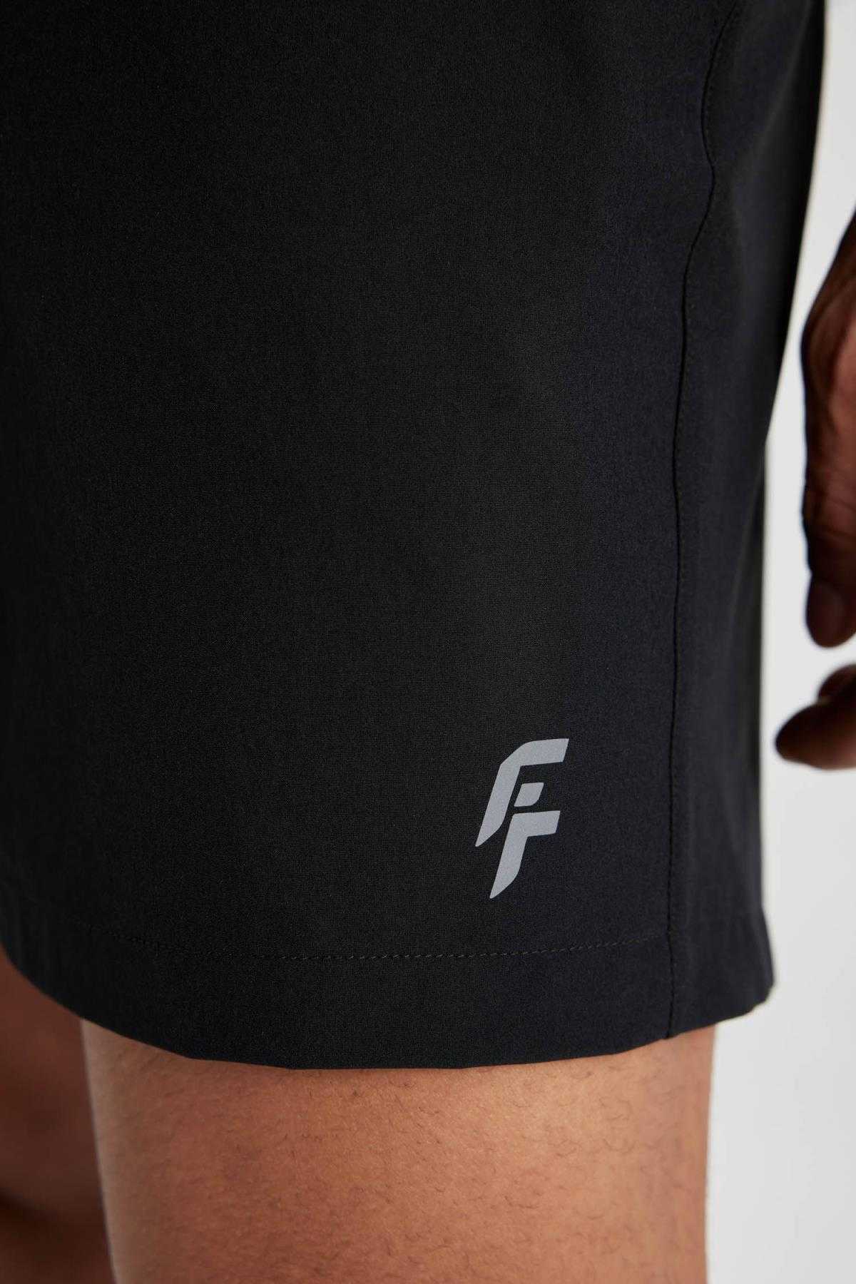 شورت شنای کوتاه بافت انعطاف پذیر چاپ شده DeFactoFit