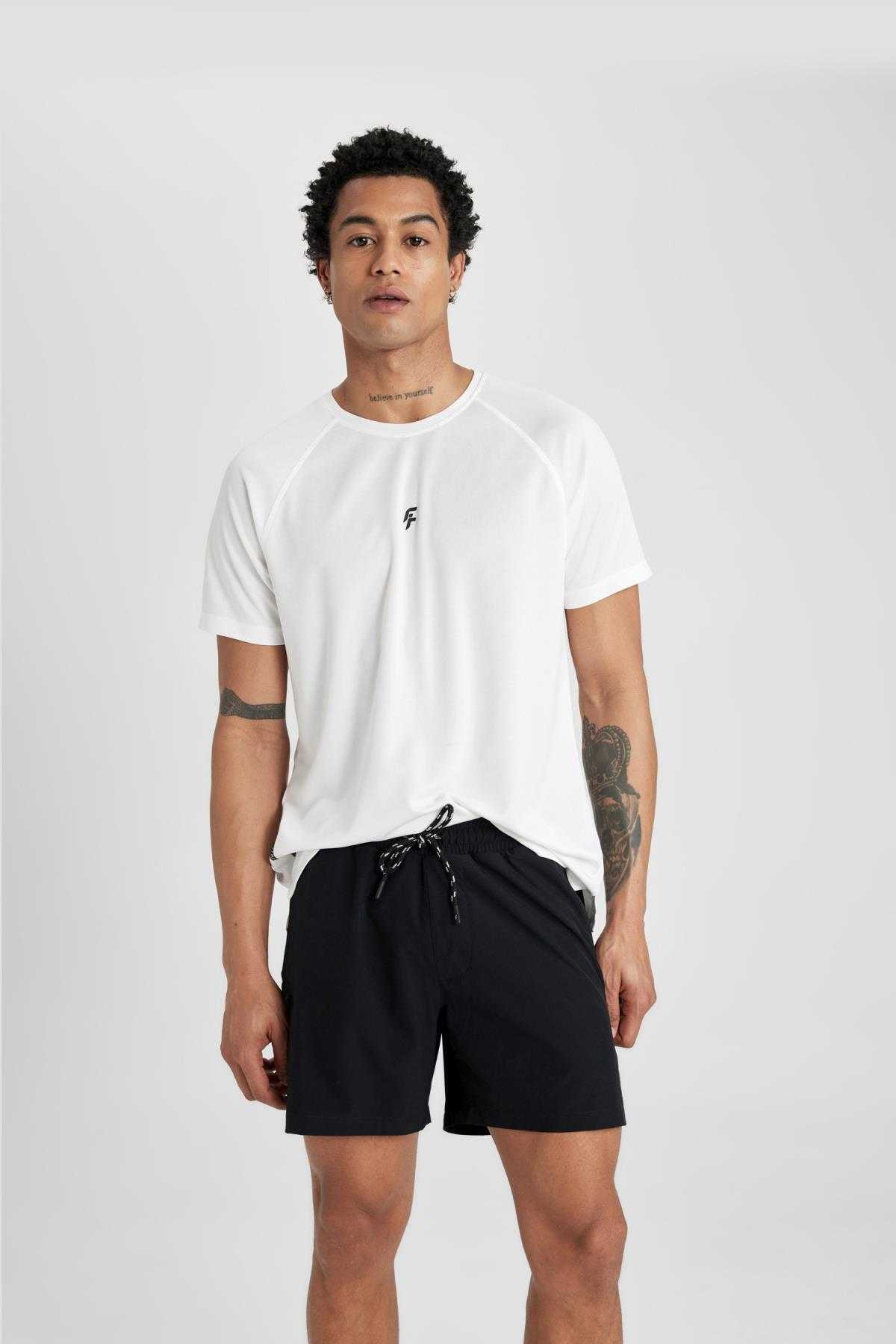 شورت شنای کوتاه بافت انعطاف پذیر چاپ شده DeFactoFit