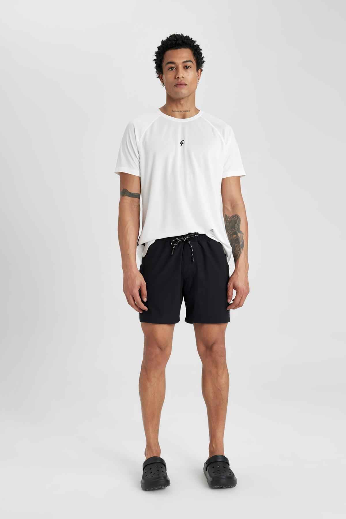 شورت شنای کوتاه بافت انعطاف پذیر چاپ شده DeFactoFit