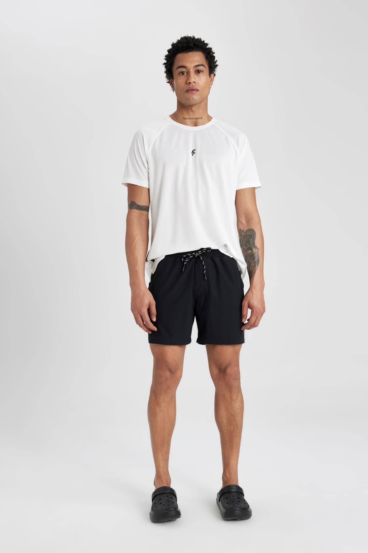 شورت شنای کوتاه بافت انعطاف پذیر چاپ شده DeFactoFit