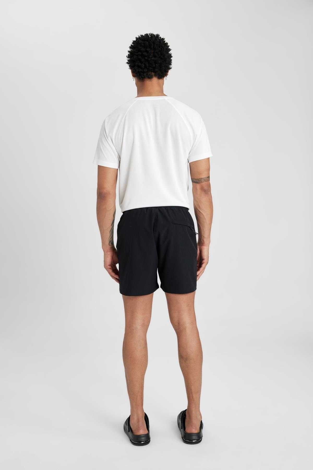 شورت شنای کوتاه بافت انعطاف پذیر چاپ شده DeFactoFit