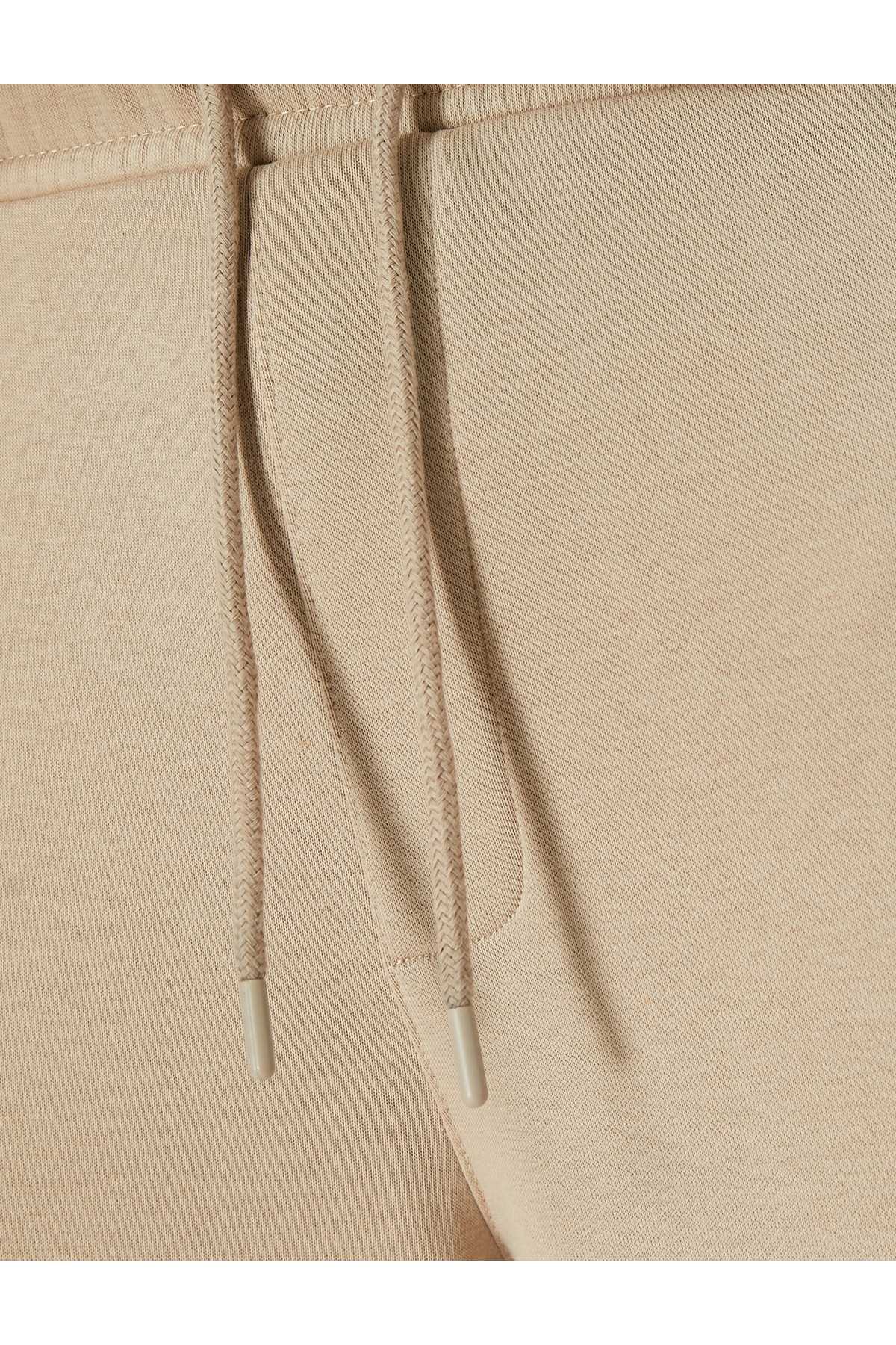 شلوار ورزشی Jogger با دور کمر توری و جزئیات جیب