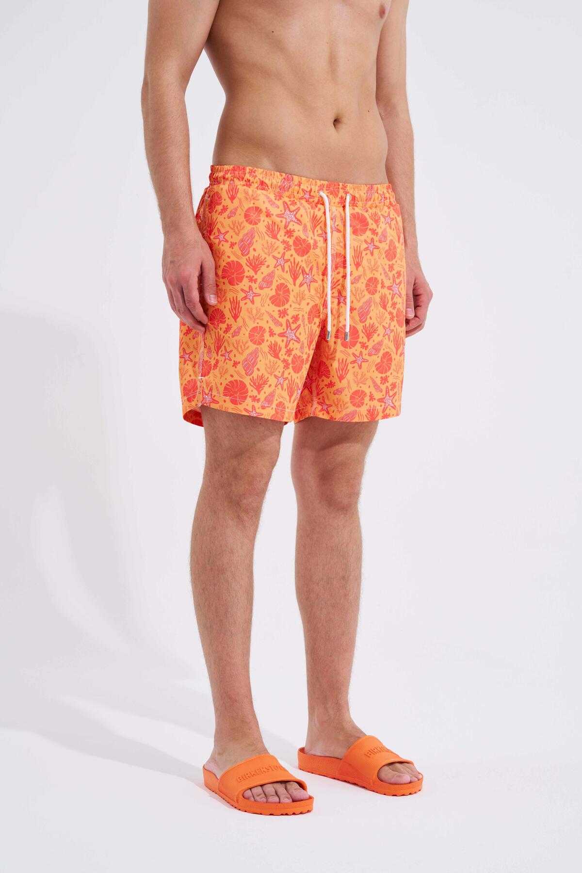 شلوار شنا مردانه با چاپ صدف زرد