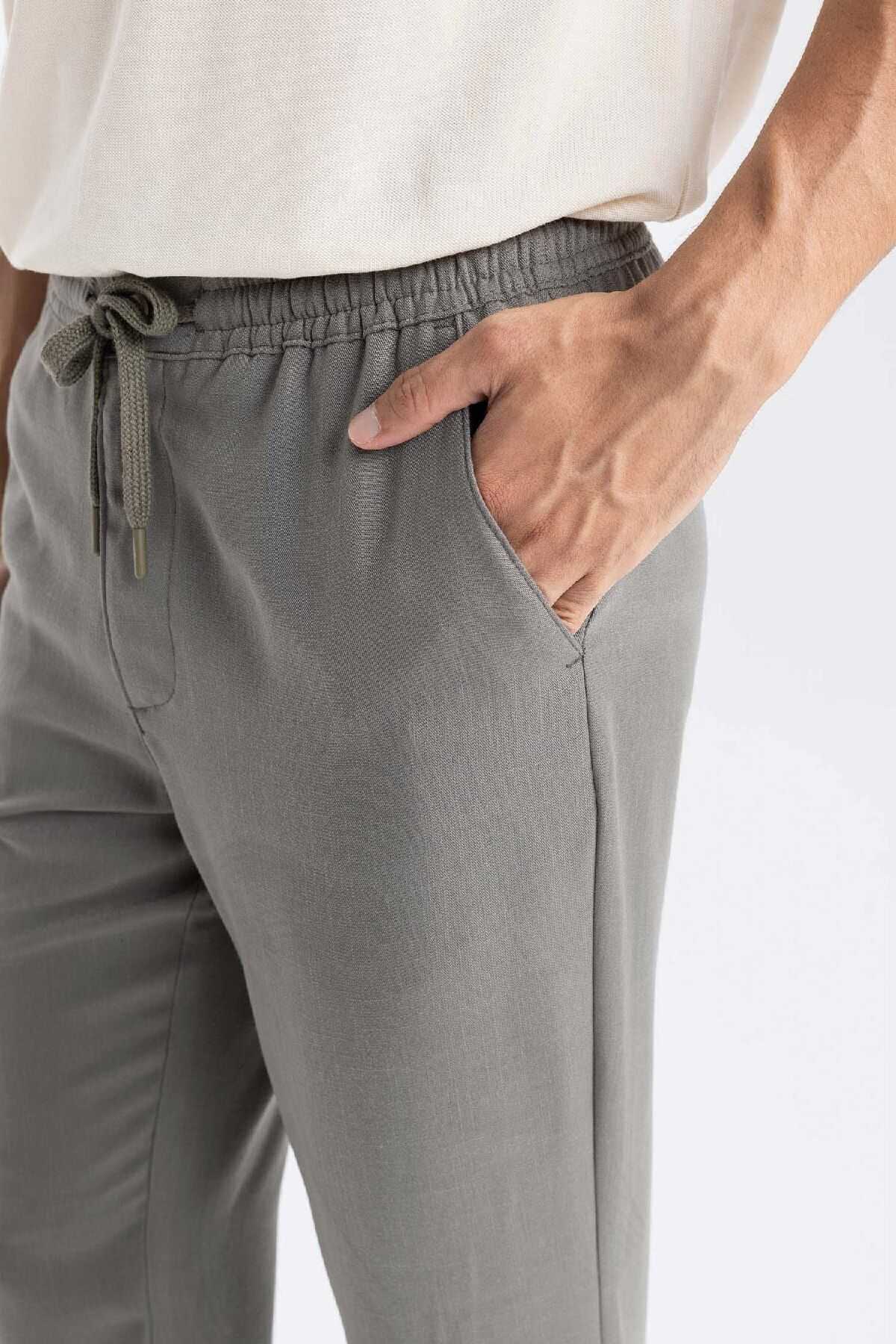 شلوار جیبی توری کمری باریک مردانه خاکی جوگر D8638ax24au