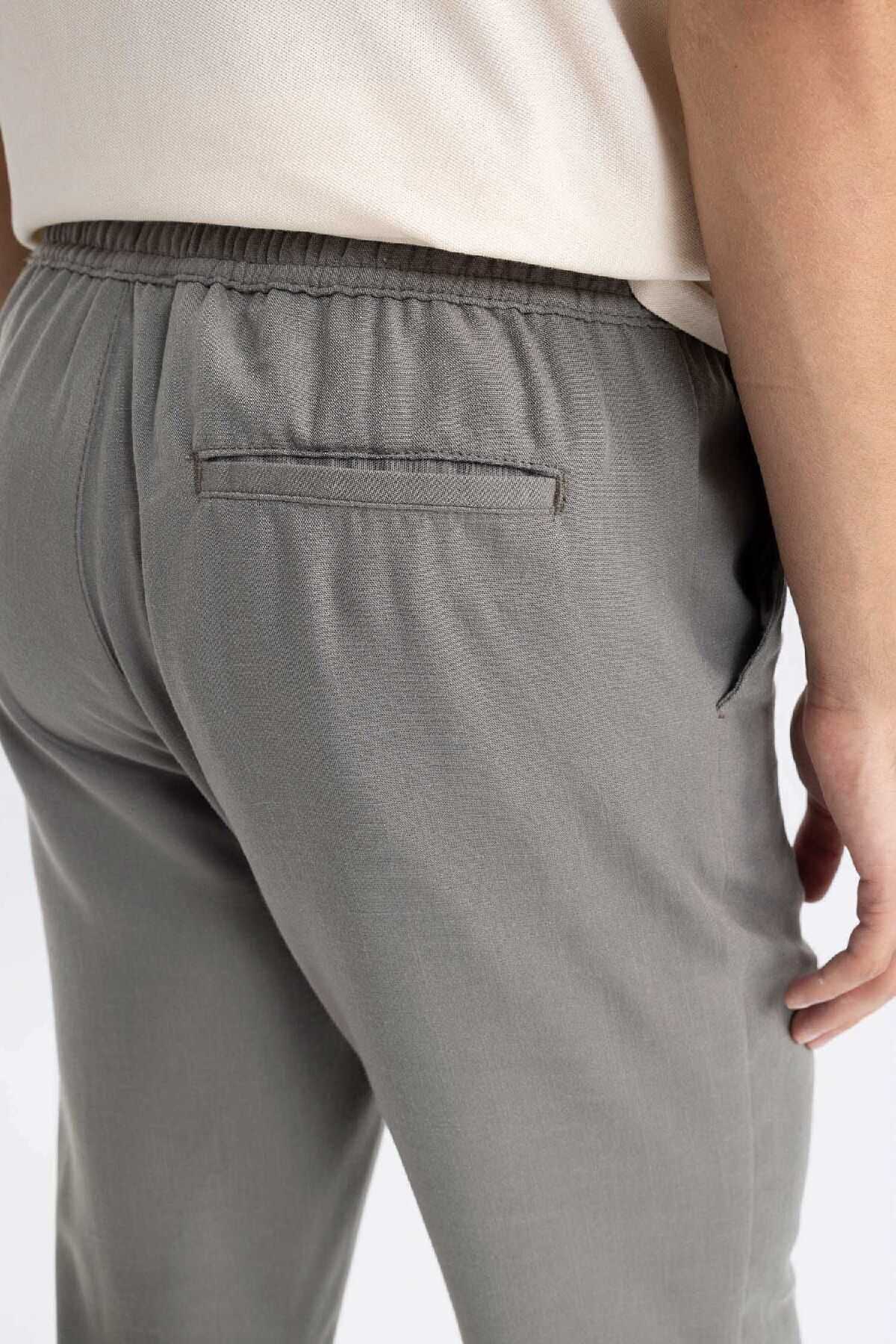 شلوار جیبی توری کمری باریک مردانه خاکی جوگر D8638ax24au