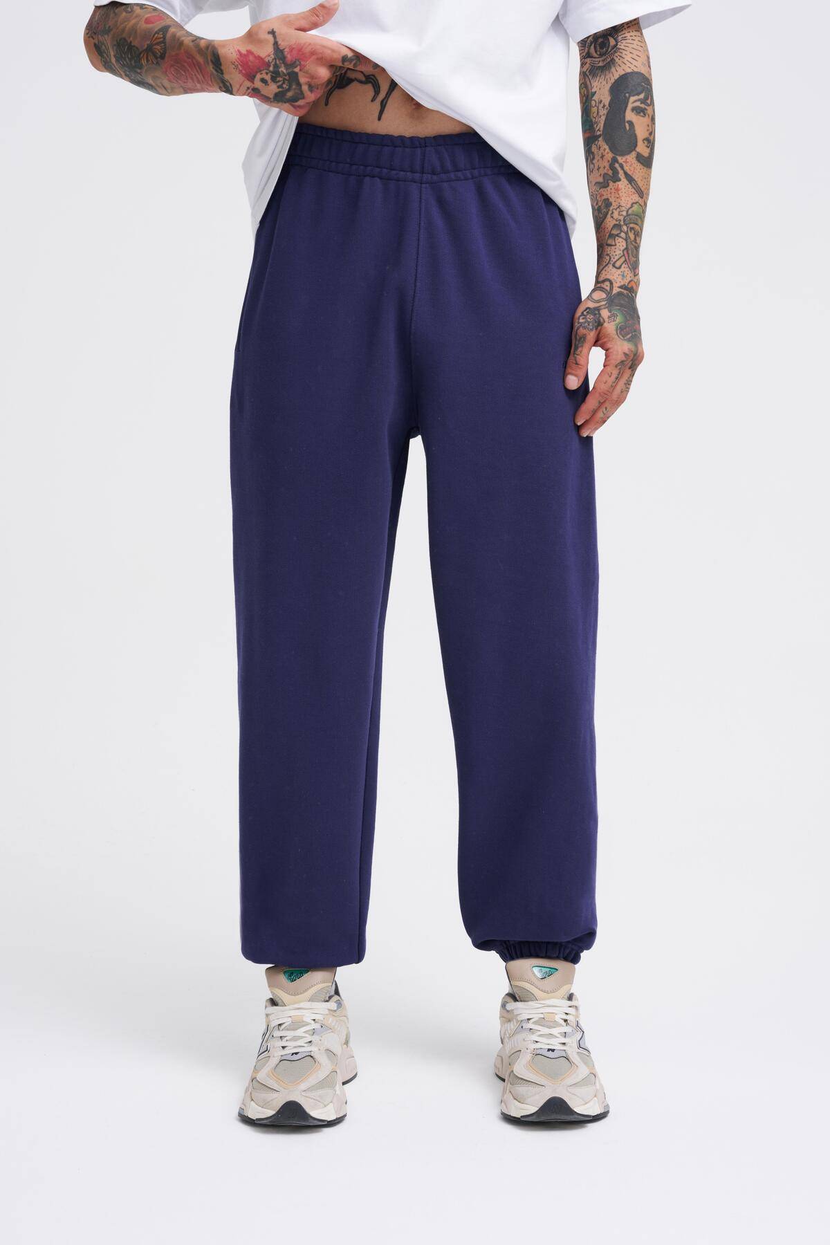 شلوار گرمکن آبی سرمه ای مورب پایه مردانه