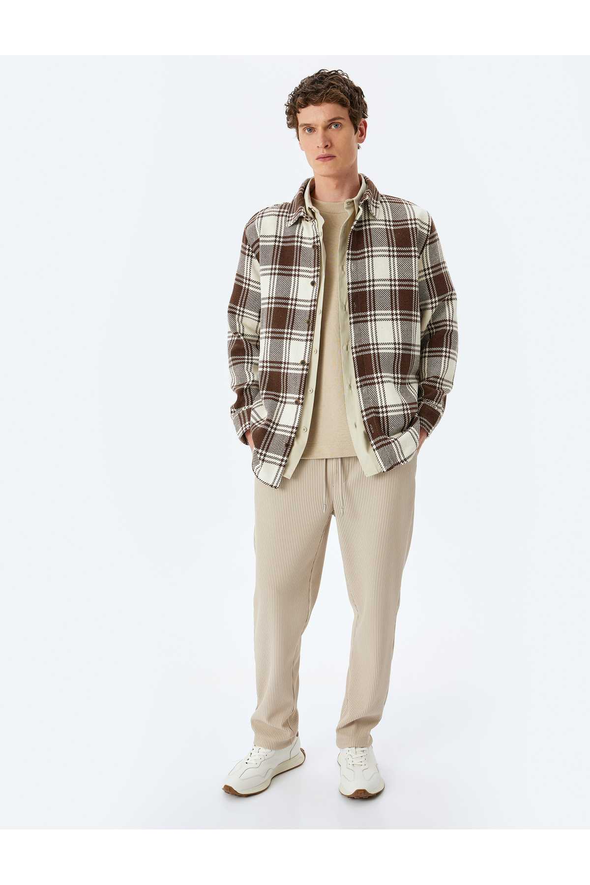 شلوار دندهدار جیبی با جزئیات با کمربند