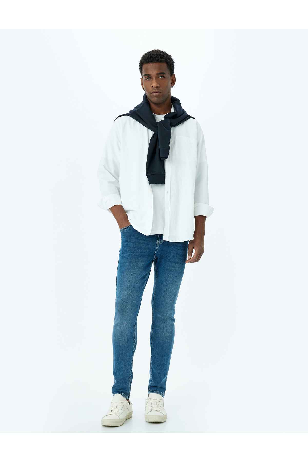 شلوار دندهدار جیبی با جزئیات با کمربند