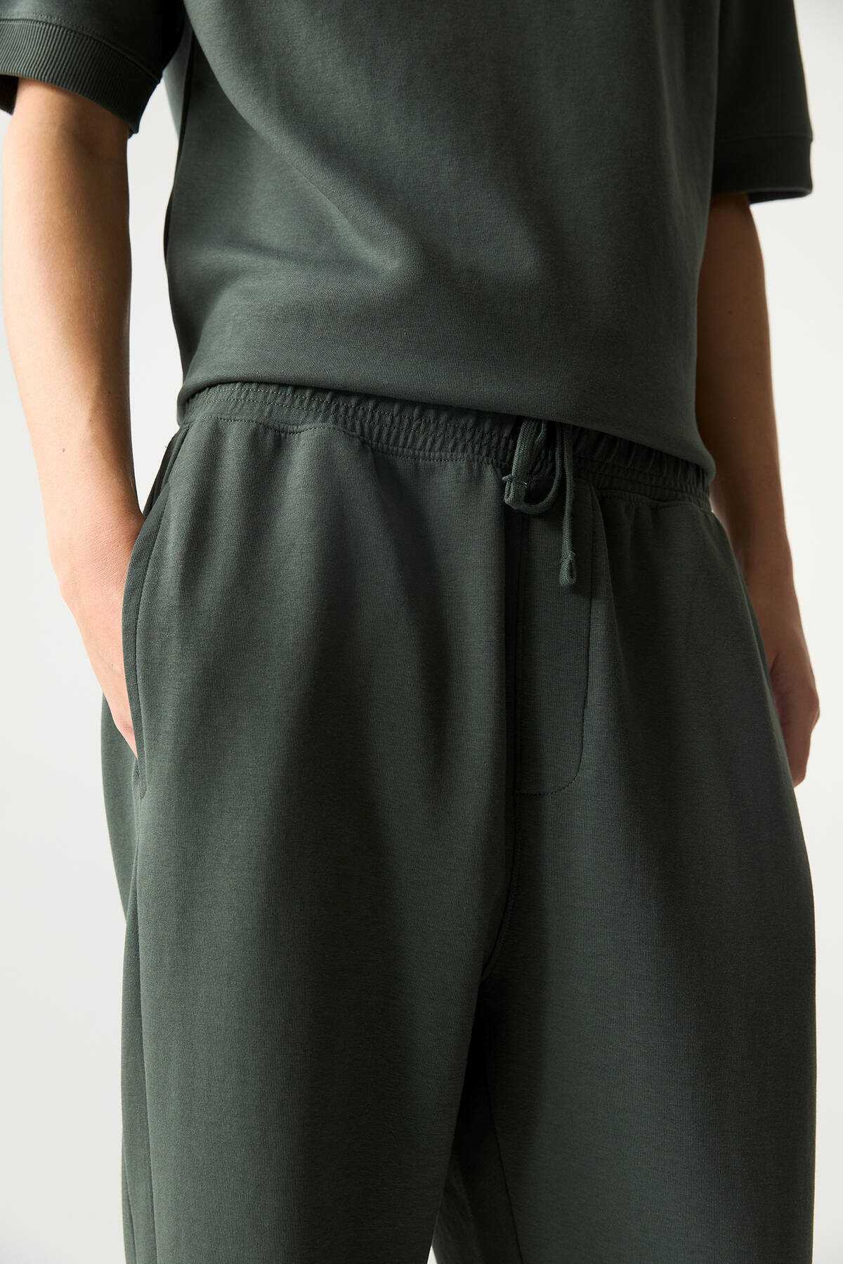 شلوار گرمکن پارچه ای اینترلاک