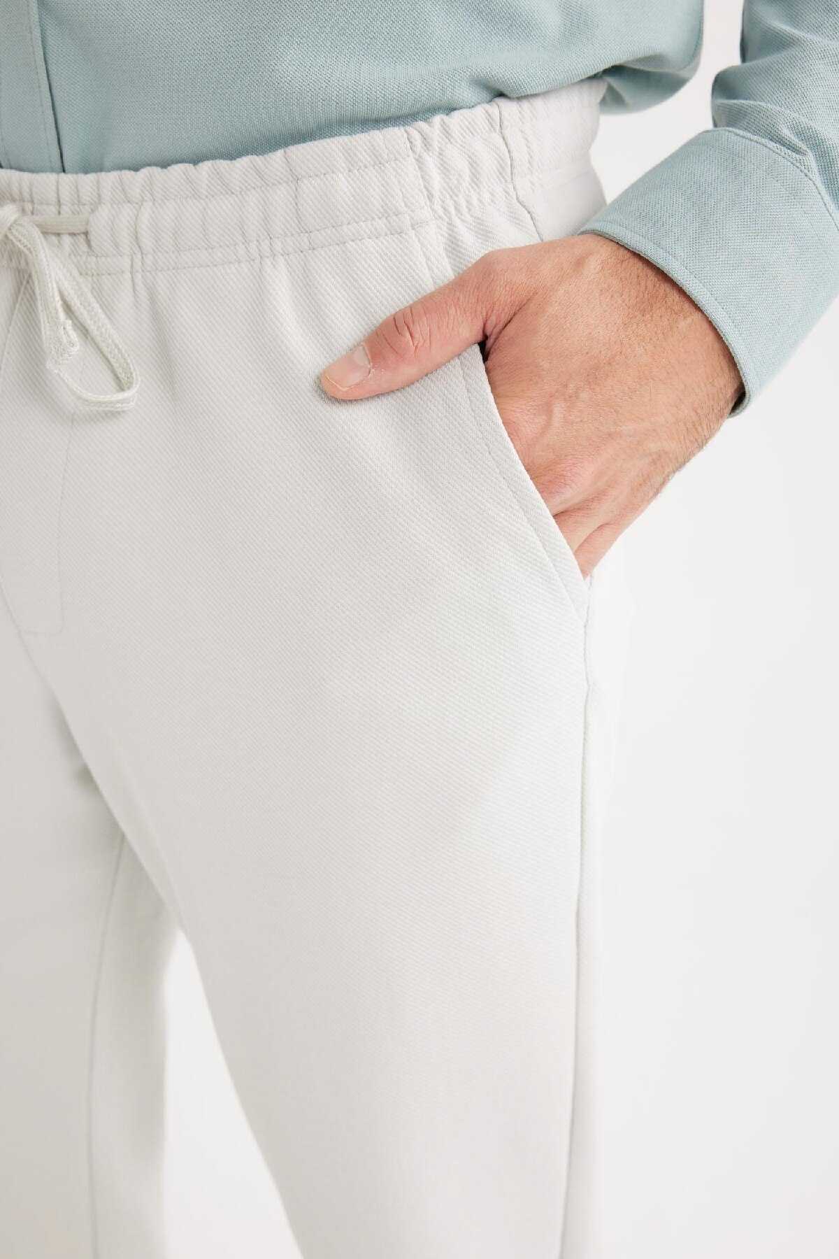 شلوار جوگر پایه بند کمر راست جیب راست C6022ax25sp